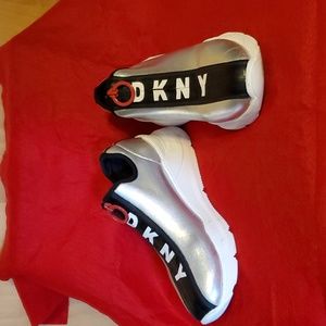 Unique DKNY Sneakers silver/black/white/red is a size 8M. Excellent used .